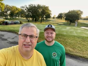 Two members of the Mosquito Joe of DuPage County team at the Medinah Country club providing a commercial mosquito control treatment.